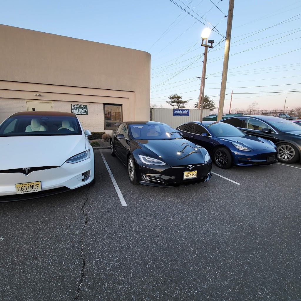 Tesla Service Center | 7 Aerial Way, Syosset, NY 11791 | Phone: (516) 864-0535