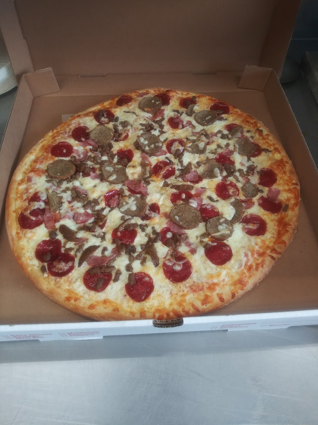 Paradise Pizza | 1363 E Lycoming St, Philadelphia, PA 19124 | Phone: (215) 289-0616